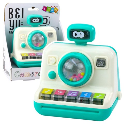 Interaktywny Aparat Pianinko Grzechotka Światła Dźwięki Biało Zielony LEAN Toys