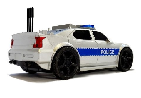 Auto Policji na Baterie 1:20 Światła i Dźwięki z Naciągiem Srebrne LEAN Toys